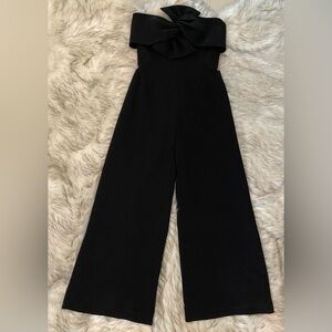 Lucian Matis.

Strapless, bow. Lined. Corset. Gold zipper.

Size 4

Worn Once.